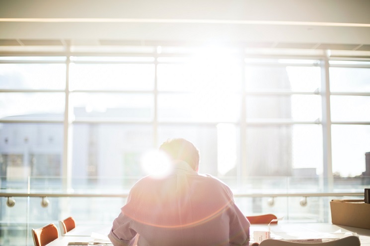 it specialist sitting at a table